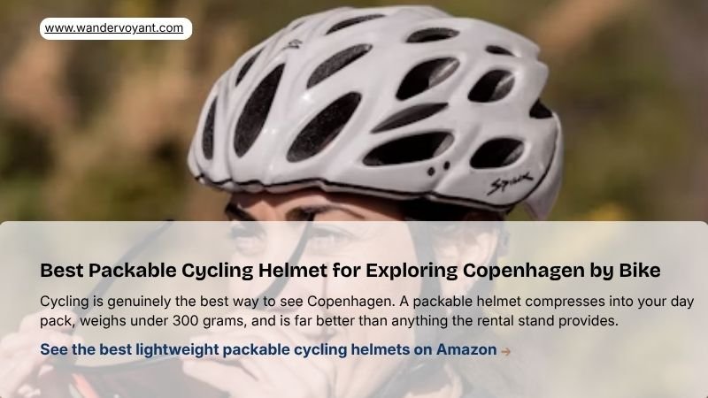Lightweight packable cycling helmet beside a Copenhagen street essential gear for exploring Denmark by bike