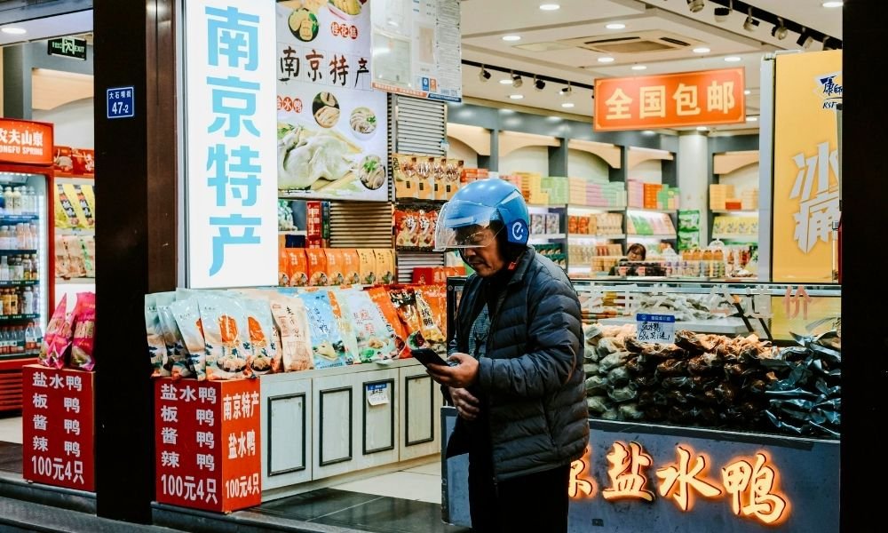Nishiki Market in Kyoto, Japan, featuring vibrant food stalls, fresh seafood, local delicacies, and traditional Japanese street food in the city's famous culinary district.