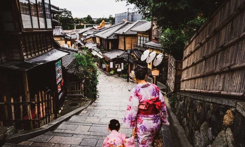 Traditional Japanese tea ceremony in Kyoto's Higashiyama and Gion districts with matcha tea served in a historic setting.