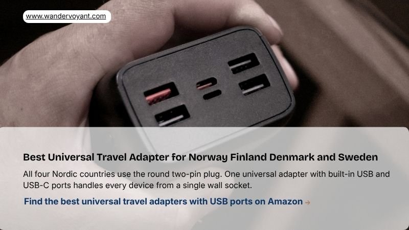 Compact universal travel adapter with USB and USB-C ports essential tech item for Norway Finland Denmark and Sweden