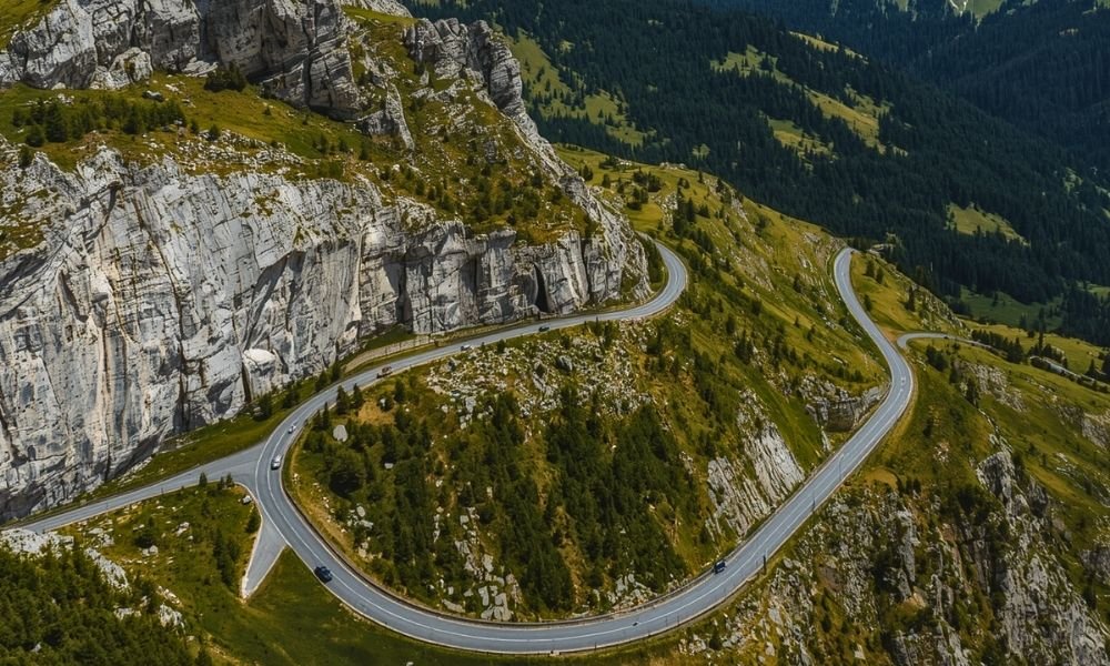 Aerial view of the Great Dolomite Road winding through alpine mountain passes in South Tyrol Italy