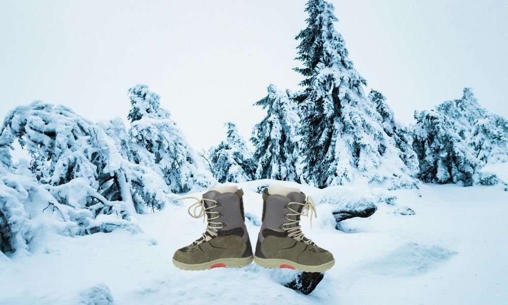 Thick insulated winter boots standing in fresh powder snow in a Finnish pine forest with golden winter light filtering through frosted branches for Finnish Lapland travel