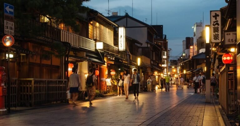Lantern-lit Hanamikoji Street in Gion at dusk, Kyoto's most iconic geisha district walking route