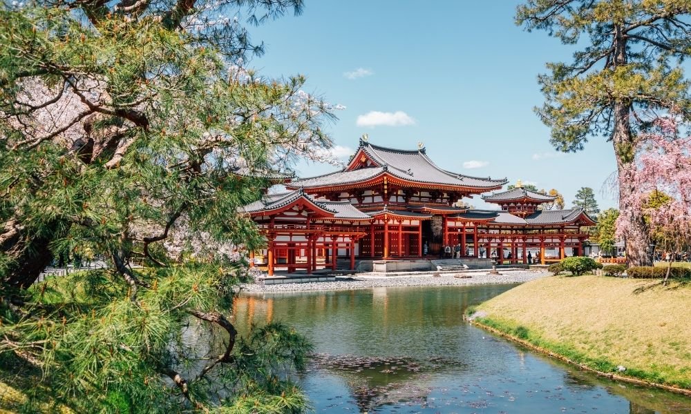 Garden at Okochi Sanso Villa in Arashiyama with walking paths, tea house, and panoramic view over Kyoto