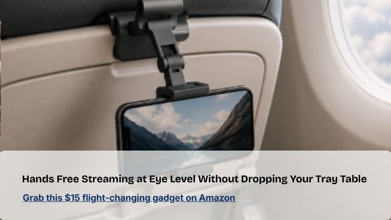 Smartphone securely attached to an airplane seat using a compact travel phone holder for hands-free entertainment during