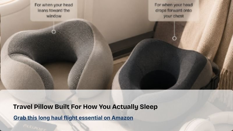 Ergonomic travel neck pillow placed on an airplane seat, designed for comfortable sleep during long-haul flights