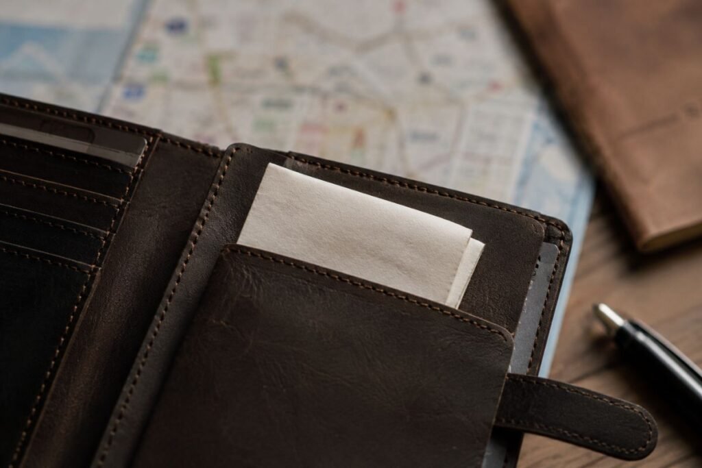 Folded paper with an address tucked inside a travel wallet