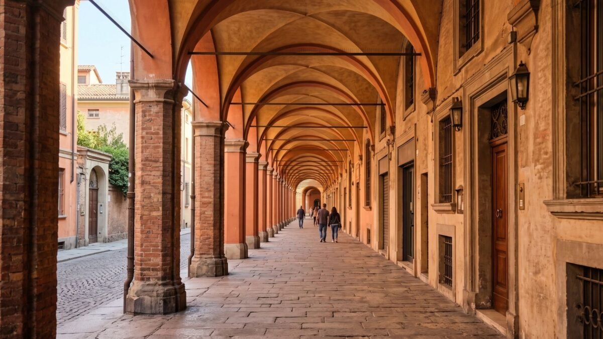 Long arched porticoes in Bologna in warm afternoon light